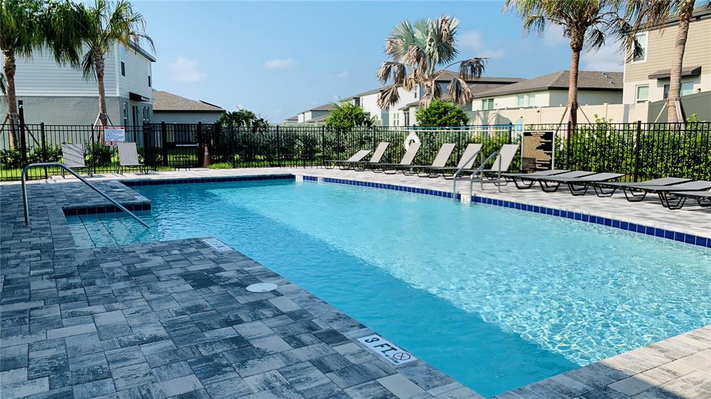 3472 Monaco Drive Davenport, FL 33897 - Photo 24 of 25 a view of swimming pool with outdoor seating and a patio