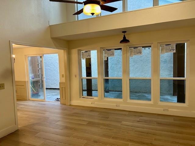 17119 Upper Bay Road Addison, TX 75001 - Photo 7 of 29 a view of a hallway with wooden floor