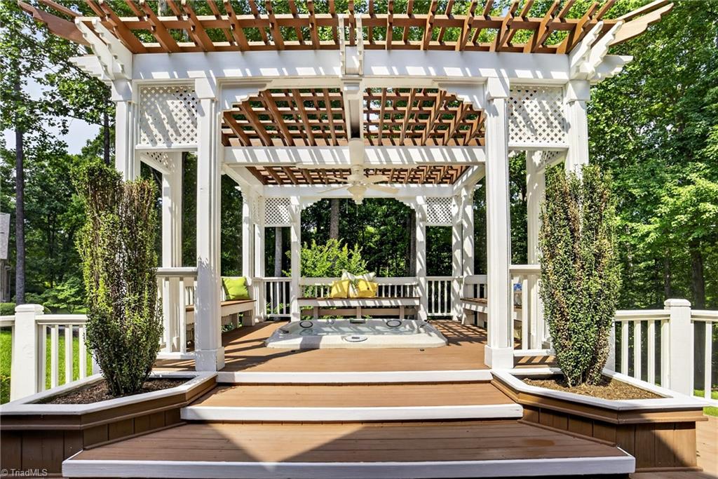 8508 Rosedale Drive Oak Ridge, NC 27310 - Photo 2 of 50 Dappled light, open air, your favorite seat in the house.