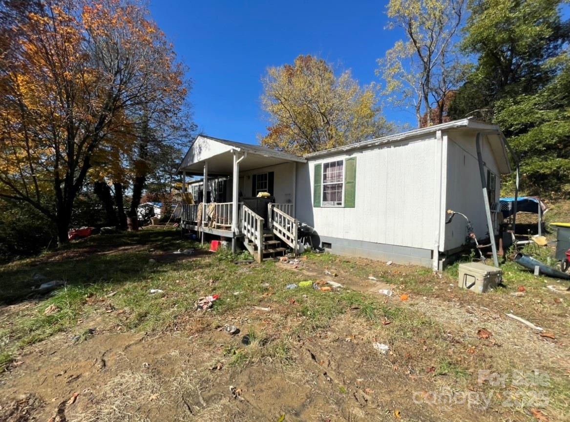 131 Lookout Road Asheville, NC 28804 - Photo 4 of 10 a view of a house with a backyard
