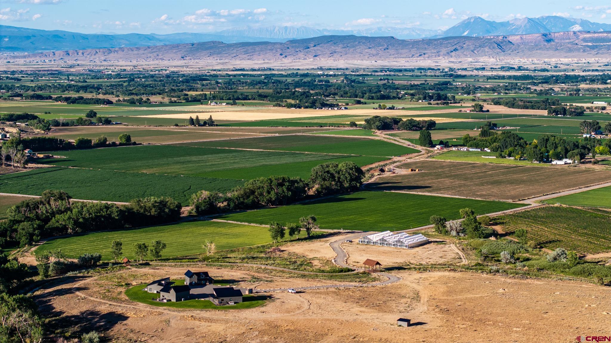 53520 Falcon Road Olathe, CO 81425 - Photo 11 of 35 an aerial view of a houses with outdoor space