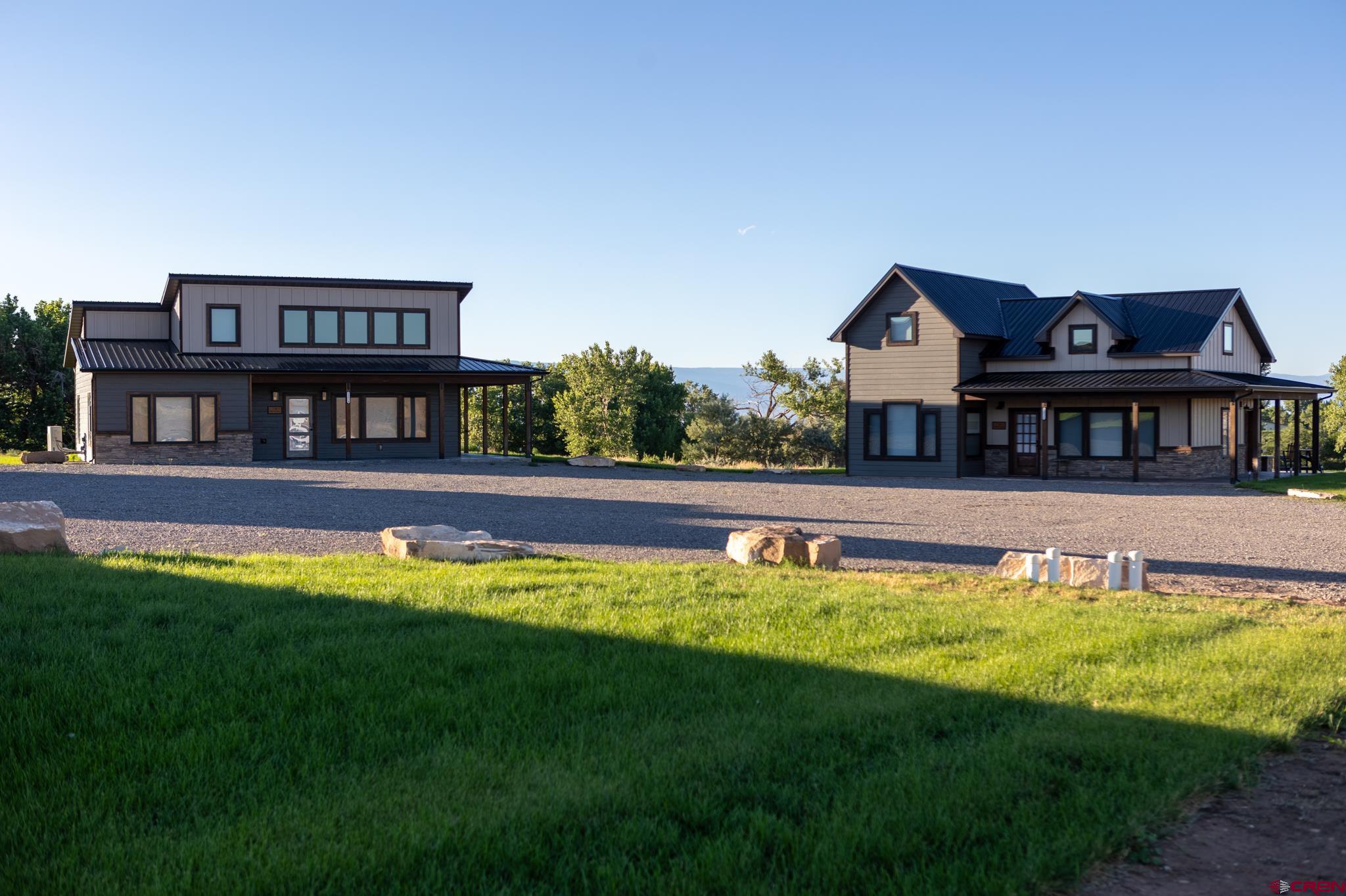53520 Falcon Road Olathe, CO 81425 - Photo 26 of 35 a house with swimming pool in front of it