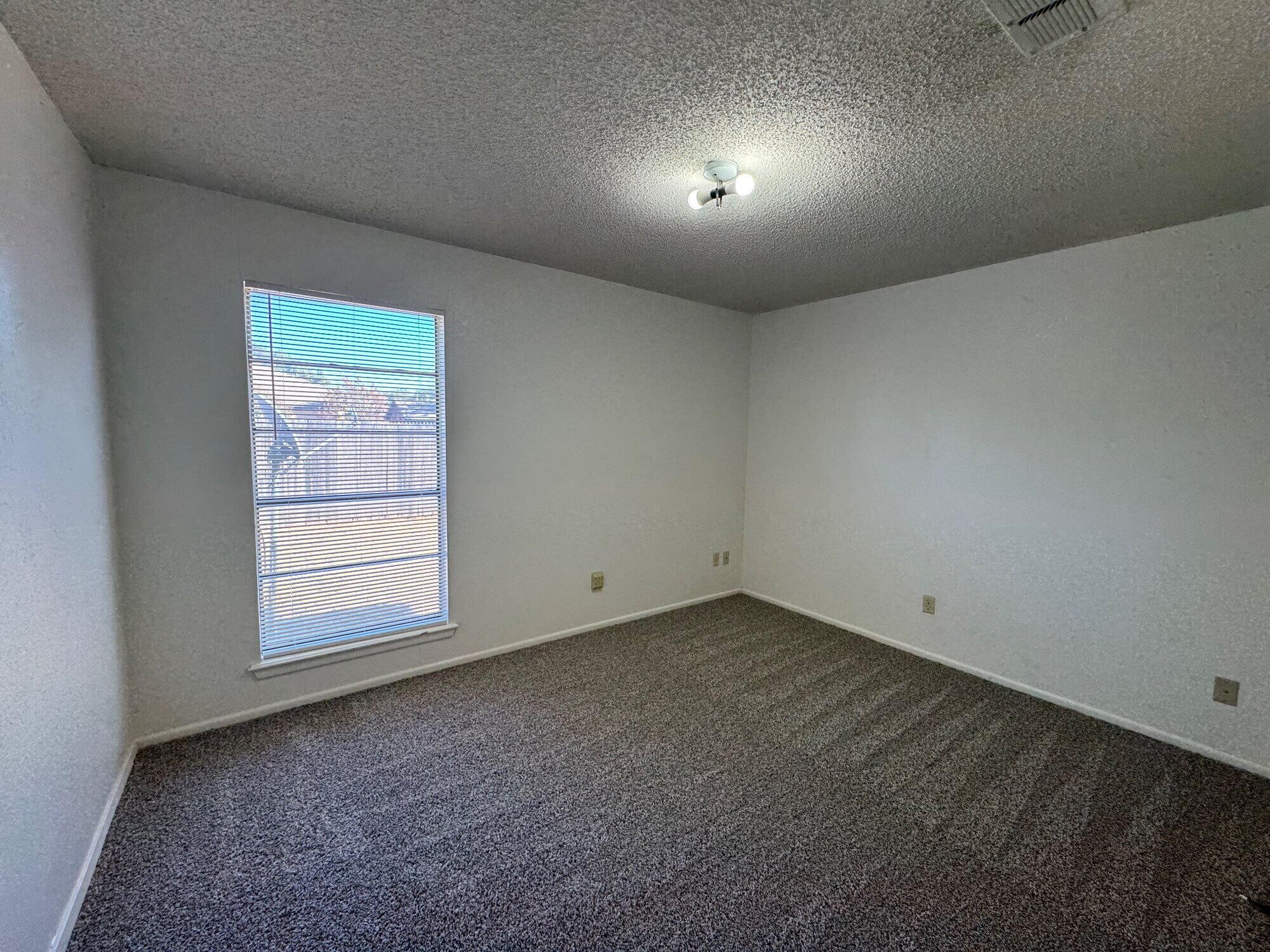 7403 Utica Avenue, Unit B Lubbock, TX 79424 - Photo 5 of 9