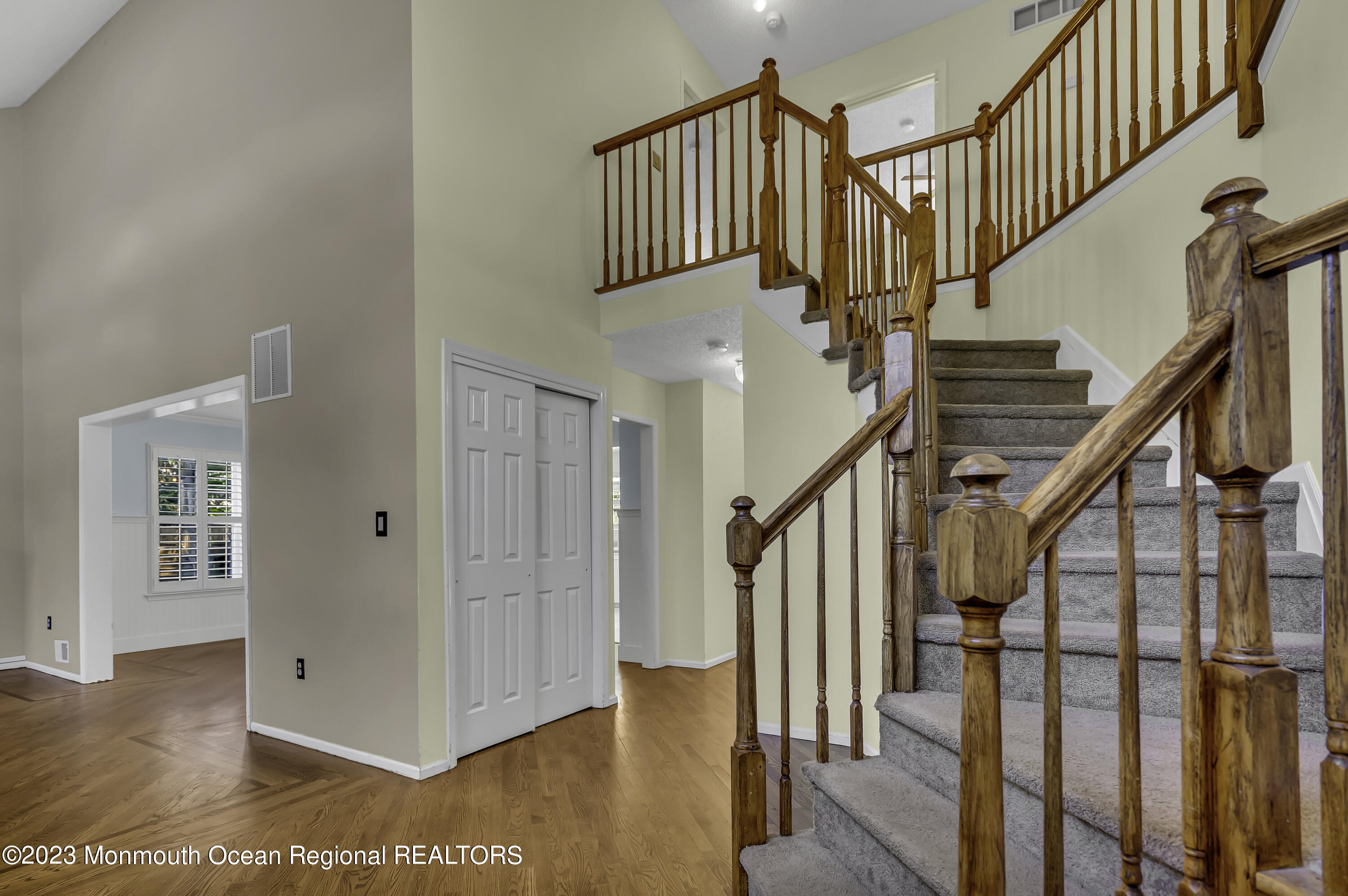 244 Down Hill Run Toms River, NJ 08755 - Photo 11 of 44 a view of entryway with wooden floor and stairs