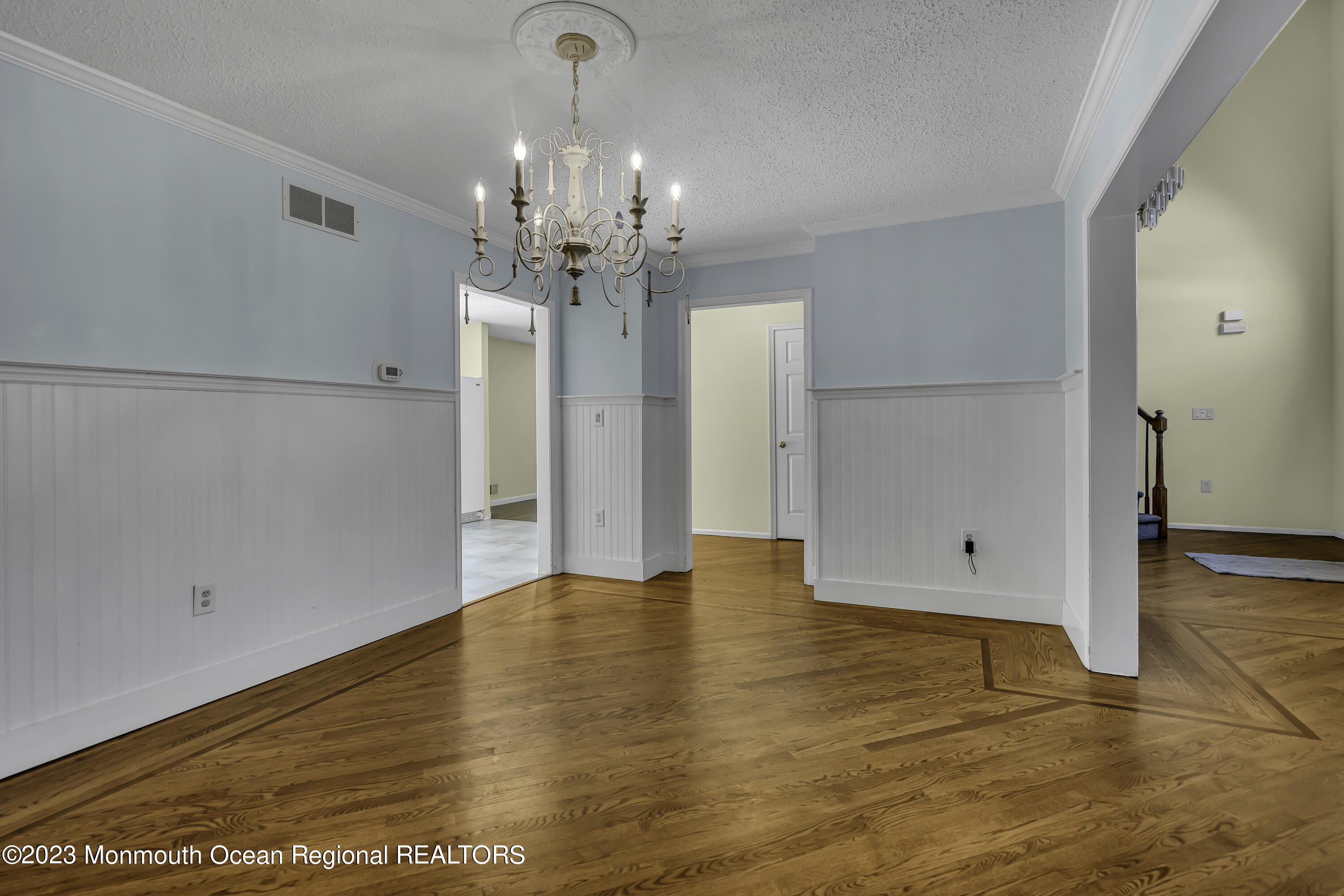 244 Down Hill Run Toms River, NJ 08755 - Photo 14 of 44 a view of a chandelier in an empty room