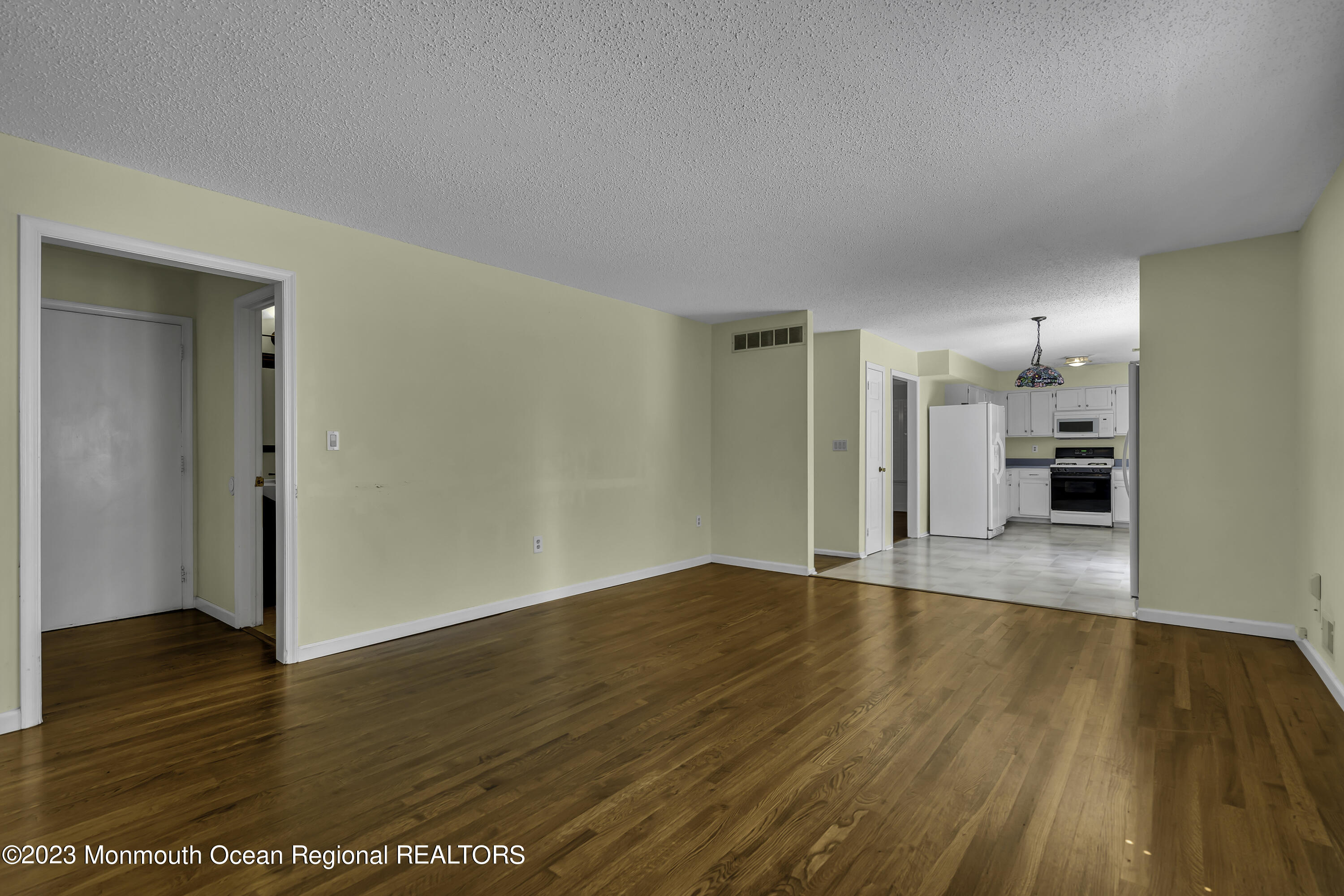 244 Down Hill Run Toms River, NJ 08755 - Photo 23 of 44 a view of empty room with wooden floor