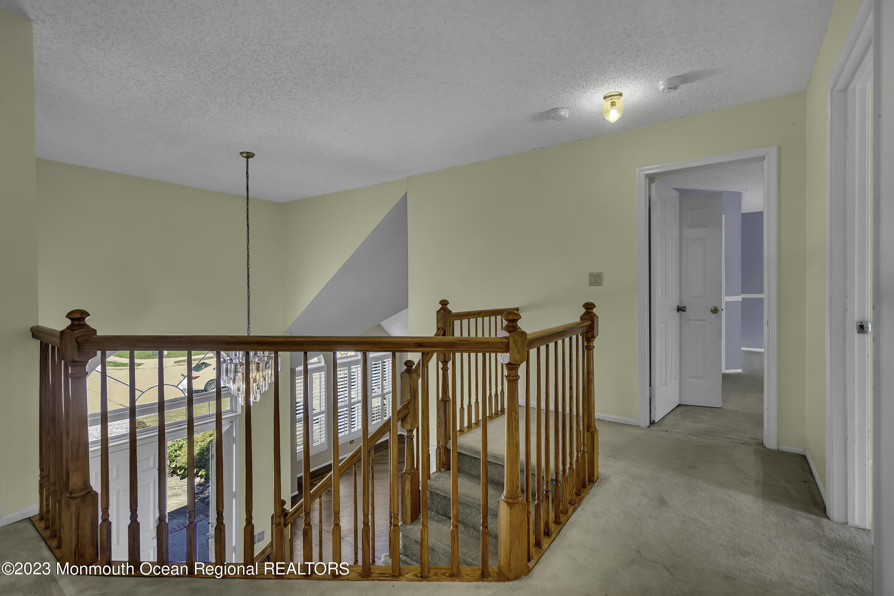 244 Down Hill Run Toms River, NJ 08755 - Photo 25 of 44 a view of a hallway with wooden floor