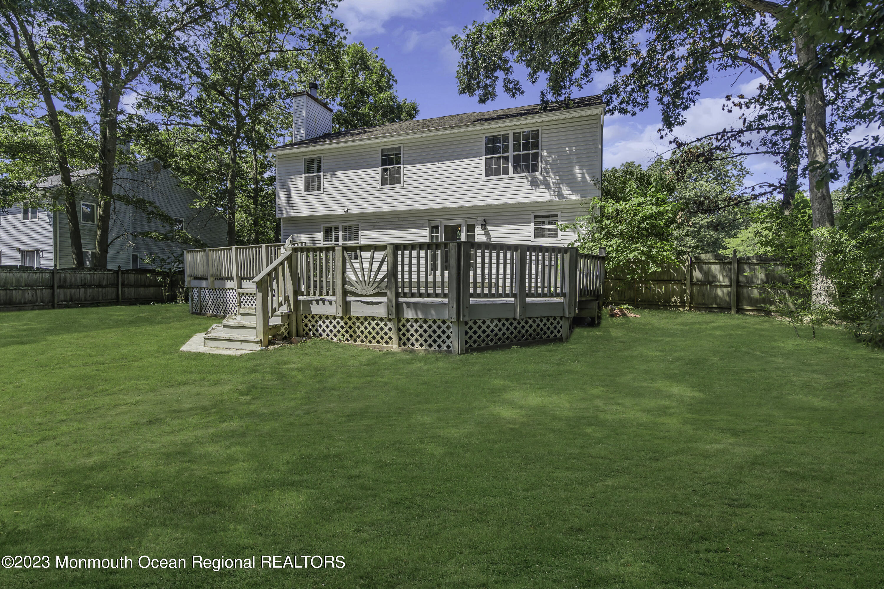 244 Down Hill Run Toms River, NJ 08755 - Photo 42 of 44 a view of a house with a yard and a swing