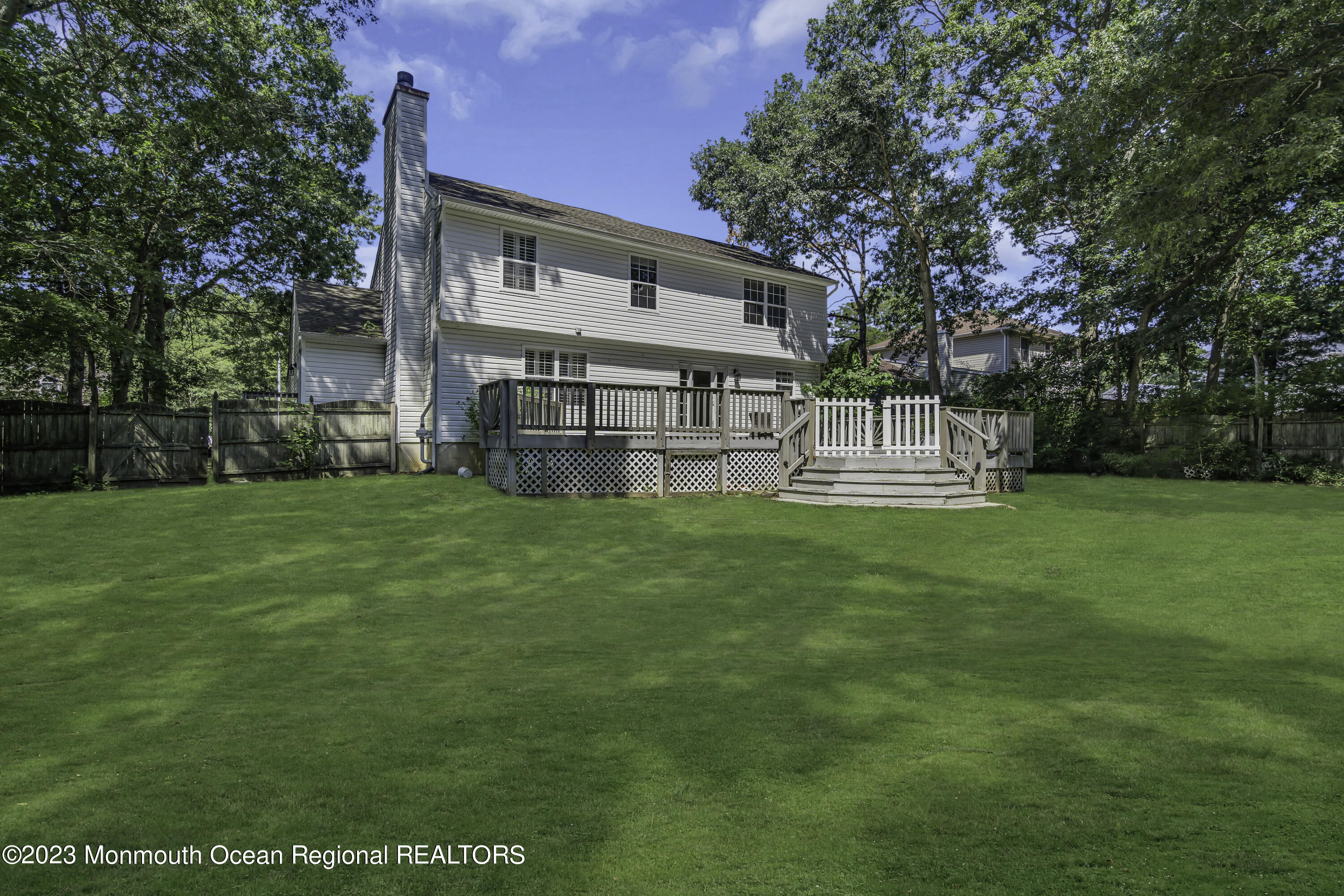 244 Down Hill Run Toms River, NJ 08755 - Photo 44 of 44 a view of a house with a yard deck and sitting area