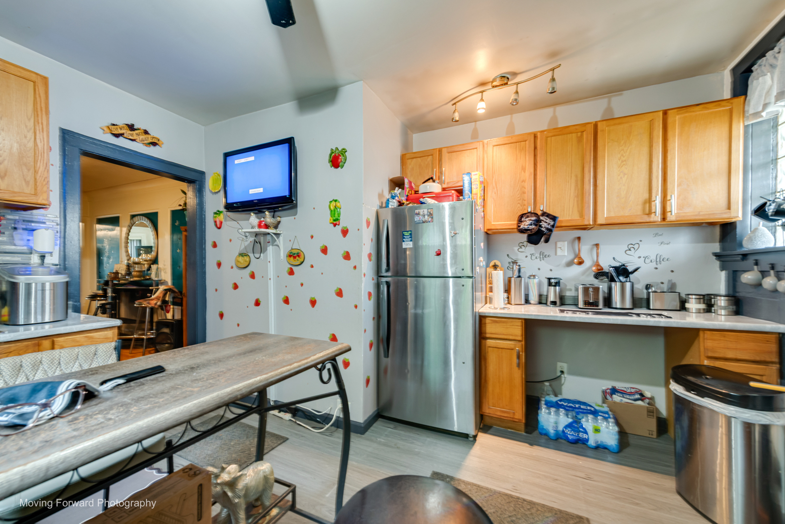8213 South Indiana Avenue Chicago, IL 60619 - Photo 15 of 25 a kitchen with stainless steel appliances a stove a refrigerator and wooden floor