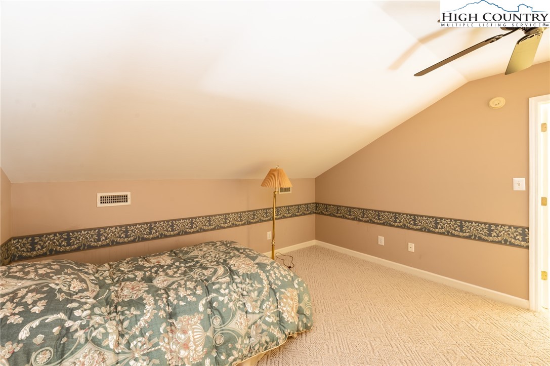 130 Prudden Lane, Unit 103 Blowing Rock, NC 28605 - Photo 16 of 36 a bathroom with a bathtub and shower