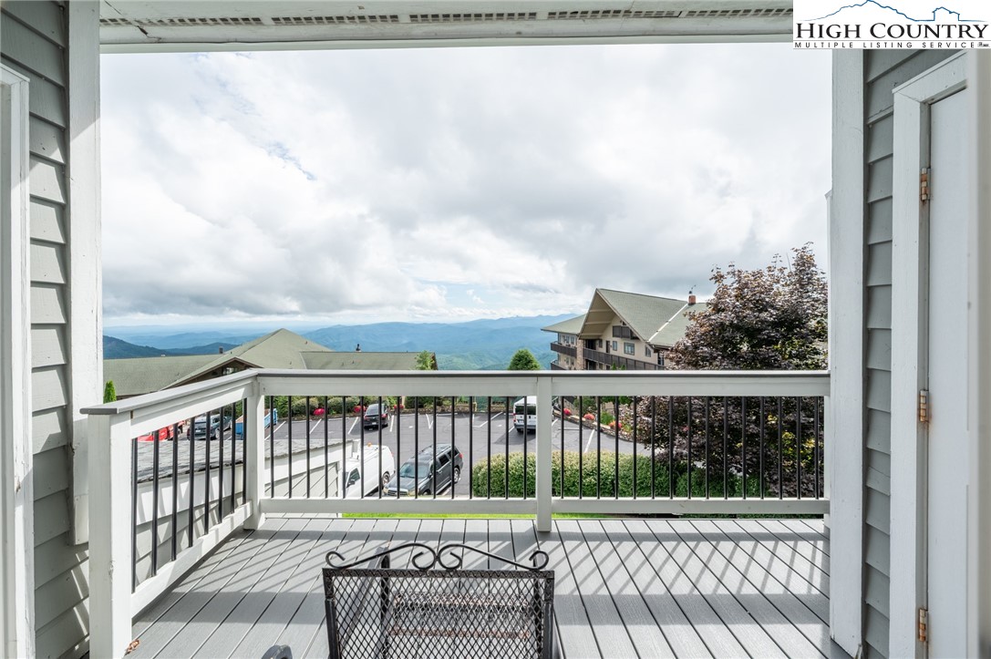 130 Prudden Lane, Unit 103 Blowing Rock, NC 28605 - Photo 33 of 36 a view of a balcony with wooden floor