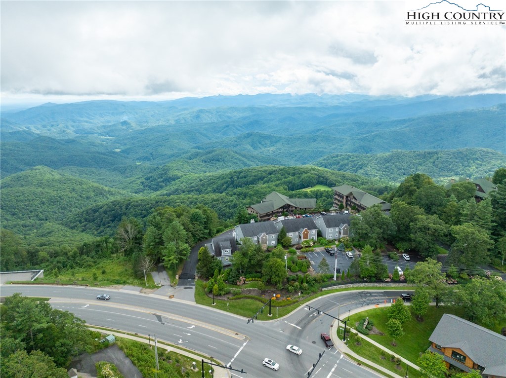 130 Prudden Lane, Unit 103 Blowing Rock, NC 28605 - Photo 6 of 36 an aerial view of residential houses with outdoor space and trees