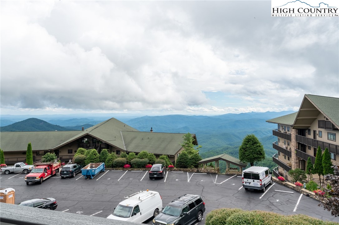 130 Prudden Lane, Unit 103 Blowing Rock, NC 28605 - Photo 7 of 36 a car parked in front of a house