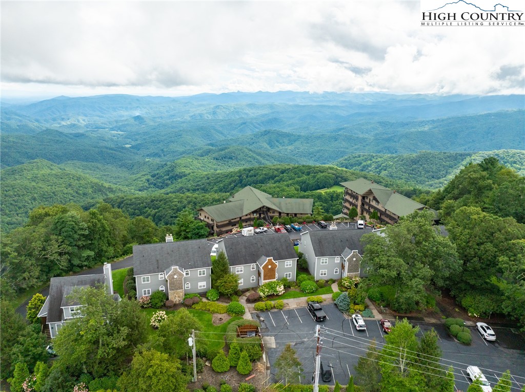 130 Prudden Lane, Unit 103 Blowing Rock, NC 28605 - Photo 8 of 36 an aerial view of residential houses with outdoor space and trees