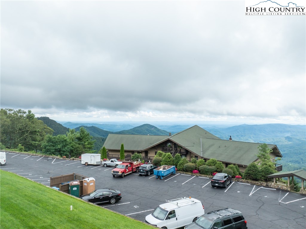 130 Prudden Lane, Unit 103 Blowing Rock, NC 28605 - Photo 9 of 36 an outdoor space with patio swimming pool and outdoor seating