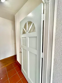 a view of an entryway with a door