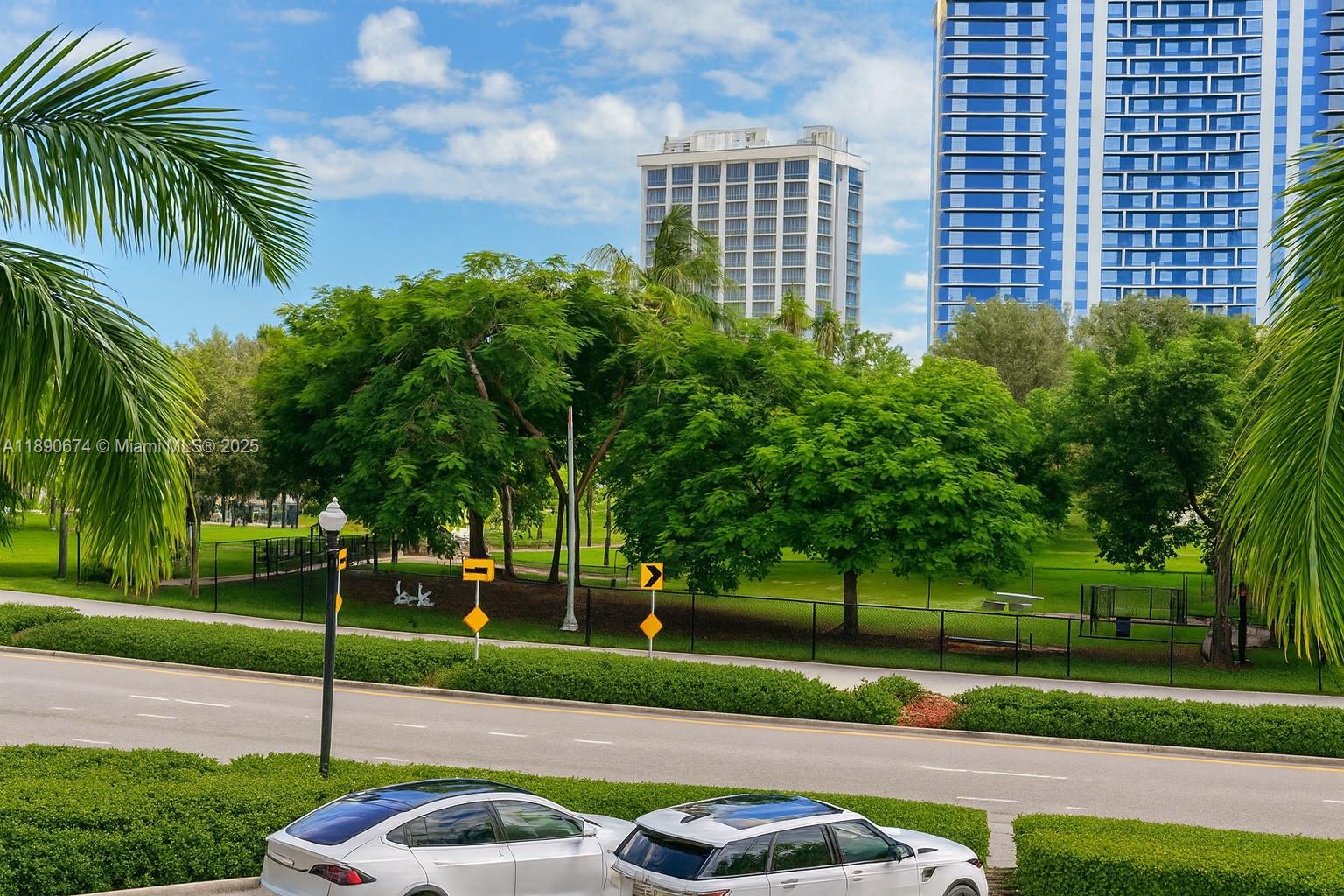 1830 Radius Drive, Unit 308 Hollywood, FL 33020 - Photo 28 of 31 a view of a house with a yard