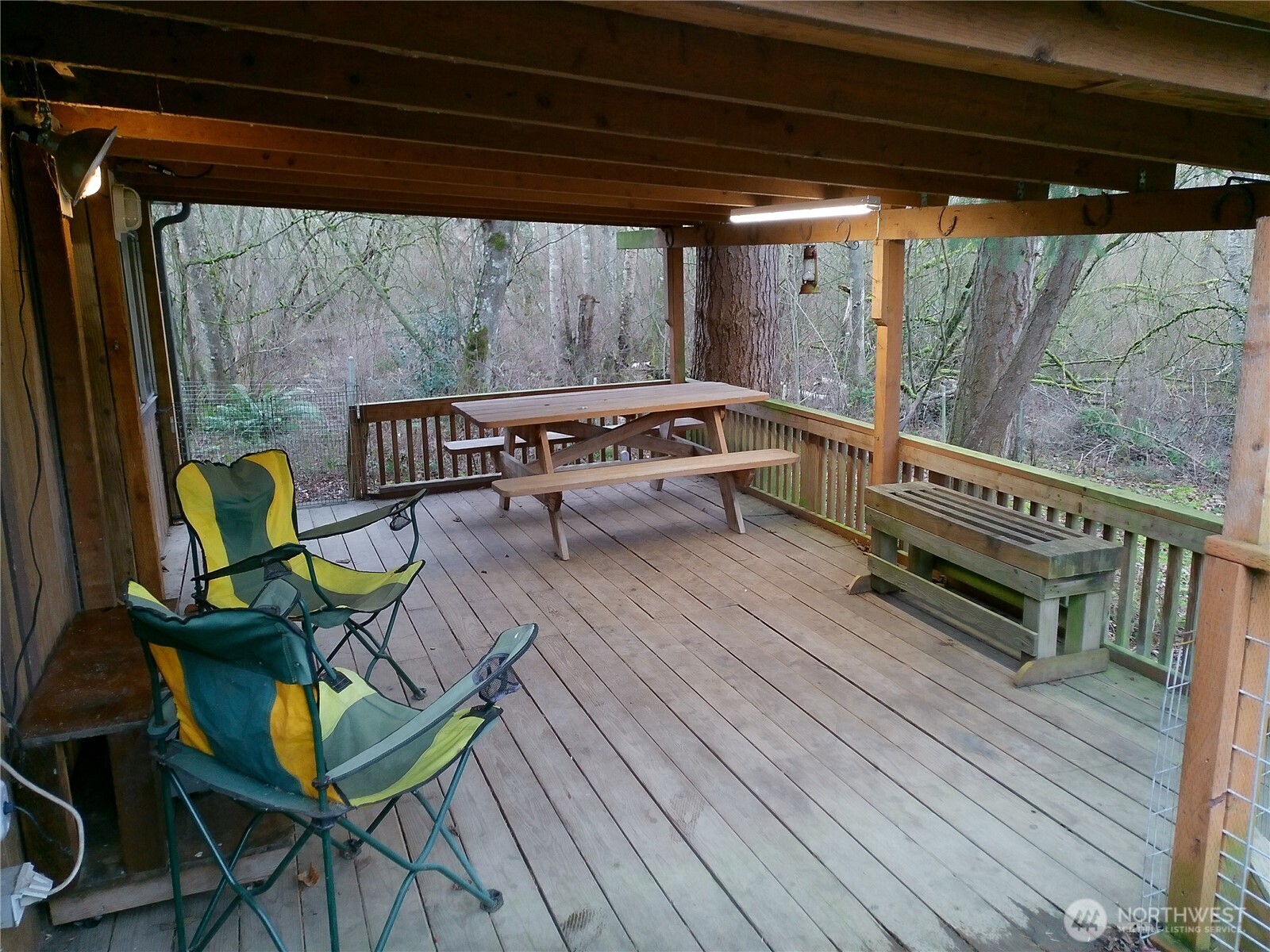 3824 Birch Bay Lynden Road Custer, WA 98240 - Photo 14 of 23 a balcony with wooden floor and outdoor seating