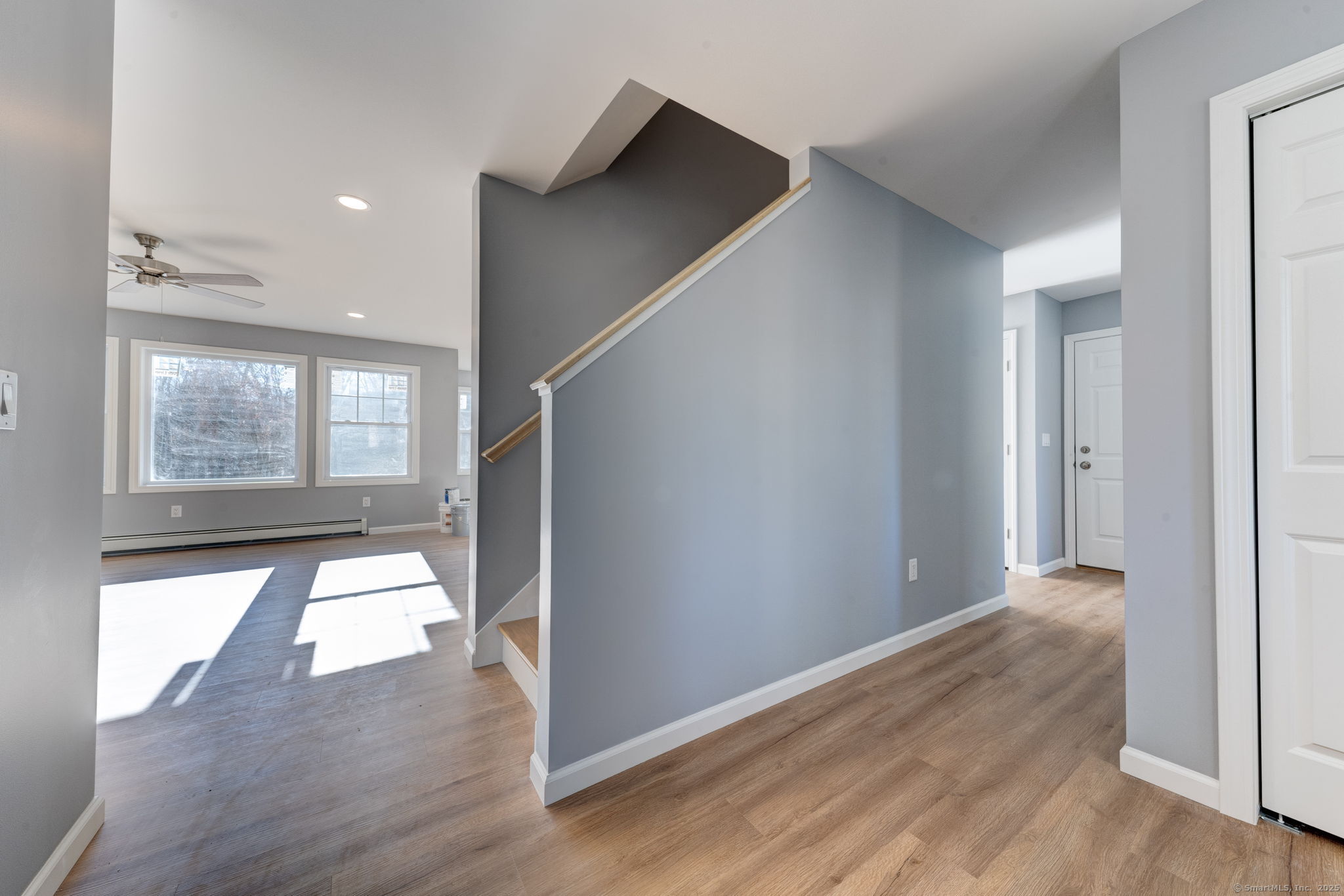 685 Wormwood Hill Road Mansfield, CT 06268 - Photo 5 of 13 wooden floor in an empty room with a window
