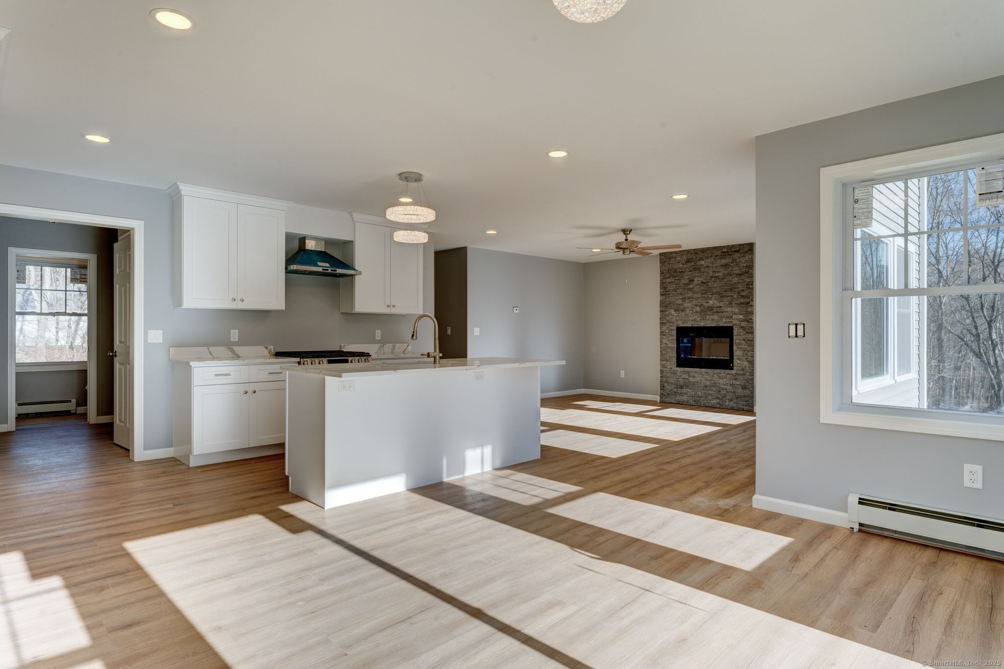 685 Wormwood Hill Road Mansfield, CT 06268 - Photo 7 of 13 a kitchen with sink and refrigerator