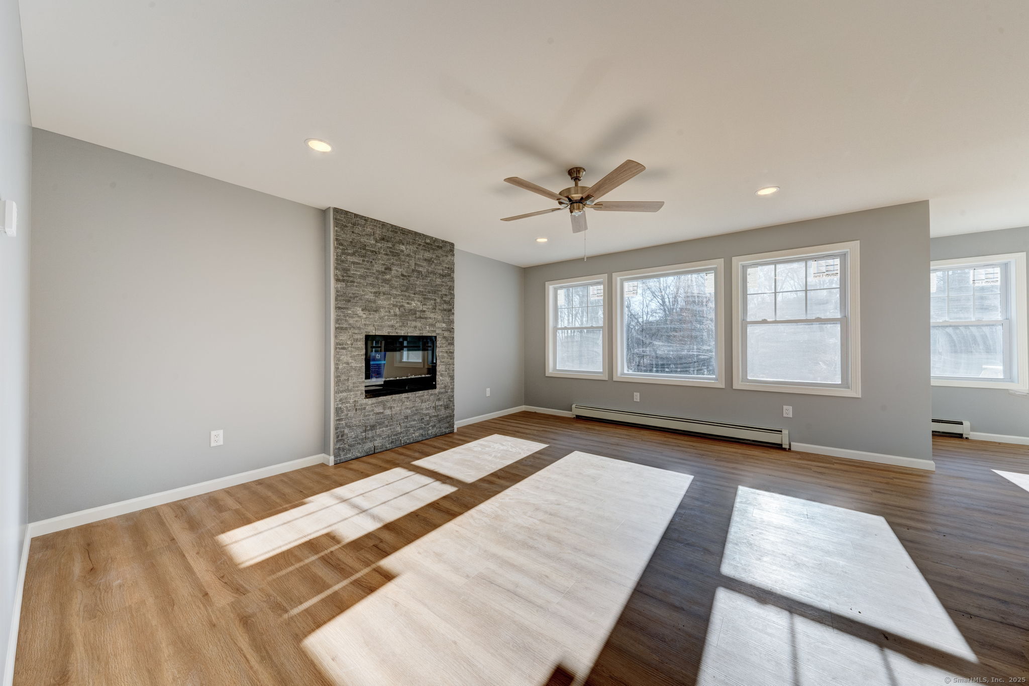 685 Wormwood Hill Road Mansfield, CT 06268 - Photo 8 of 13 a bedroom with a bed and a fireplace