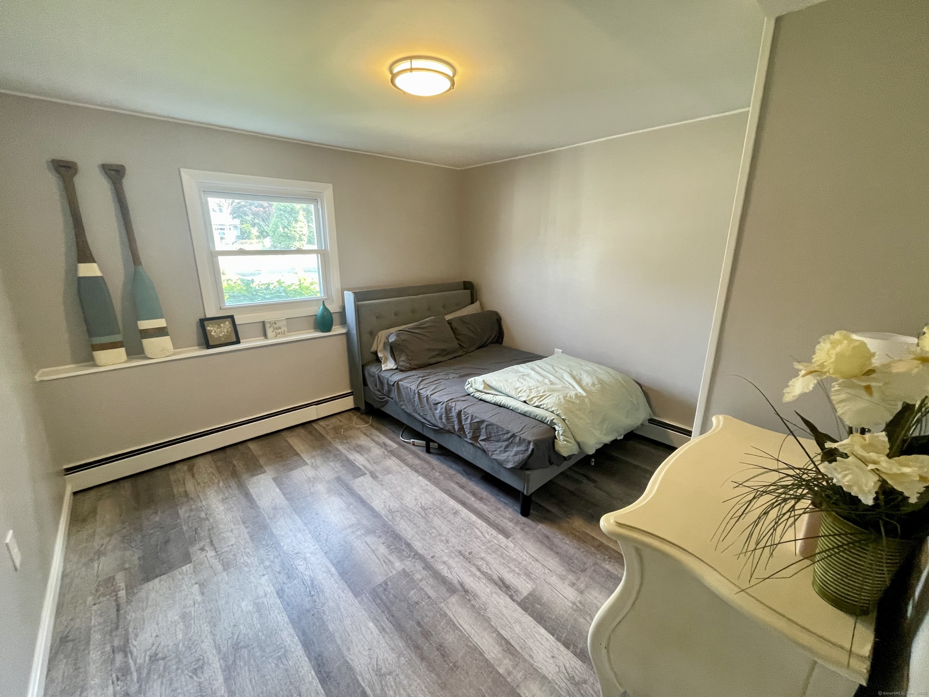 223 Seneca Drive Groton, CT 06340 - Photo 20 of 27 a bedroom with two beds and a window