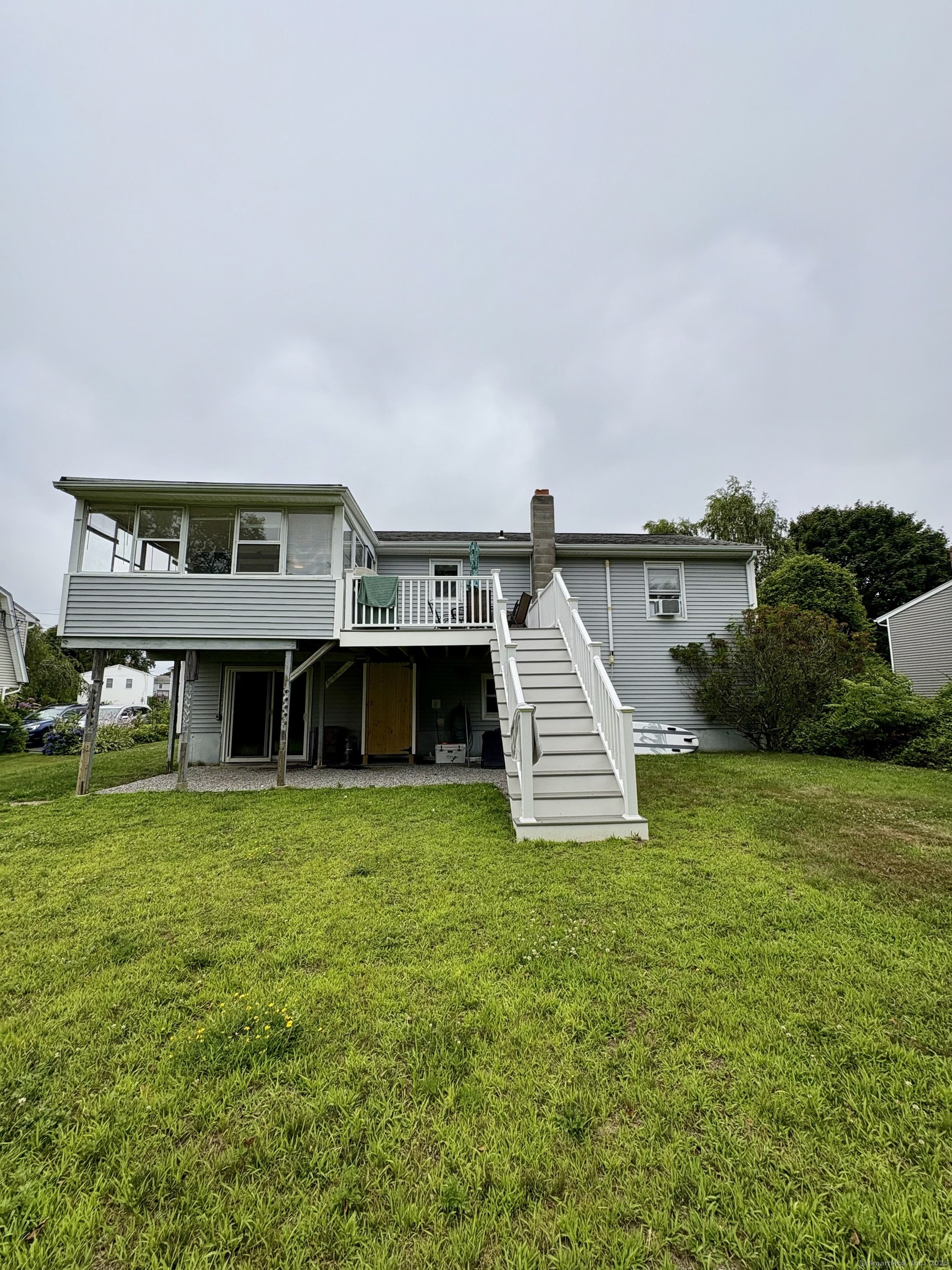 223 Seneca Drive Groton, CT 06340 - Photo 22 of 27 a view of a house with a yard