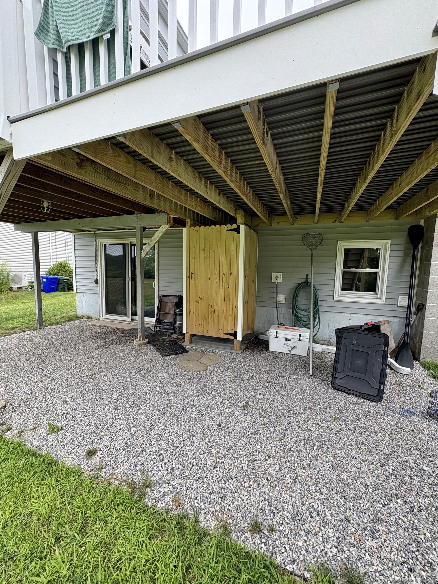 223 Seneca Drive Groton, CT 06340 - Photo 23 of 27 a backyard of a house with barbeque oven table and chairs