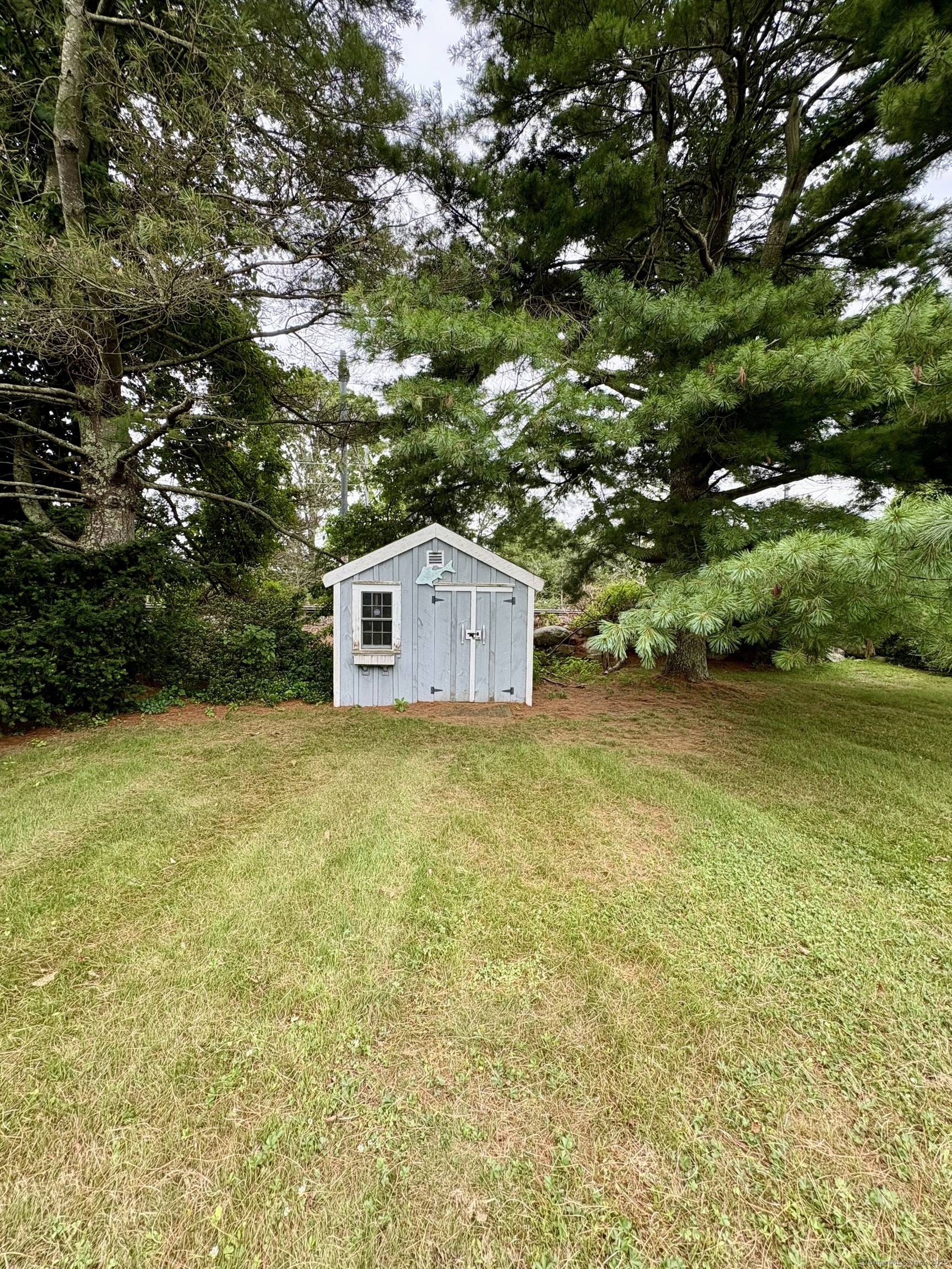 223 Seneca Drive Groton, CT 06340 - Photo 27 of 27 a backyard of a house