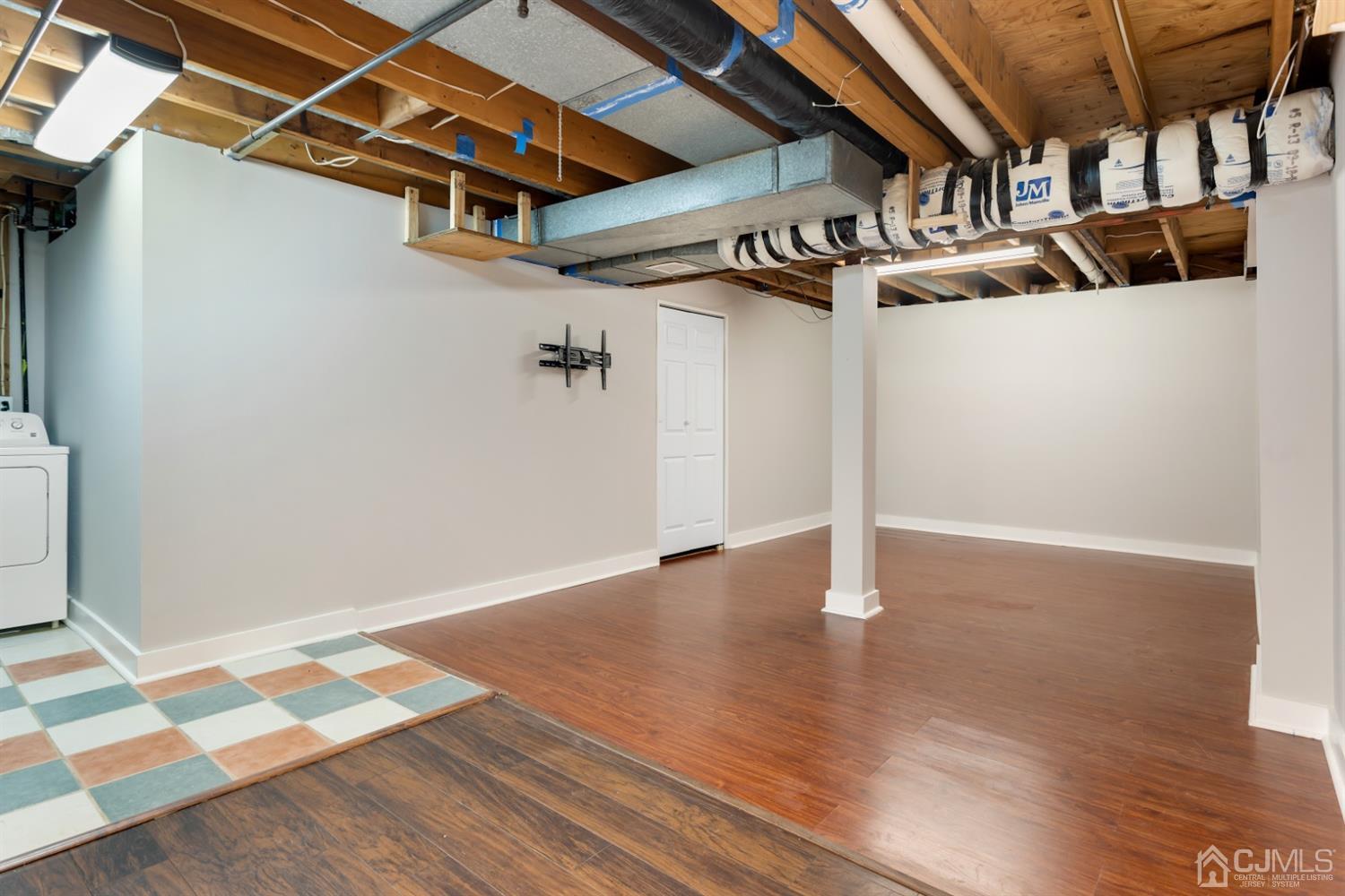 28 Arrowsmith Court Old Bridge, NJ 07747 - Photo 21 of 30 a view of a room with wooden floor