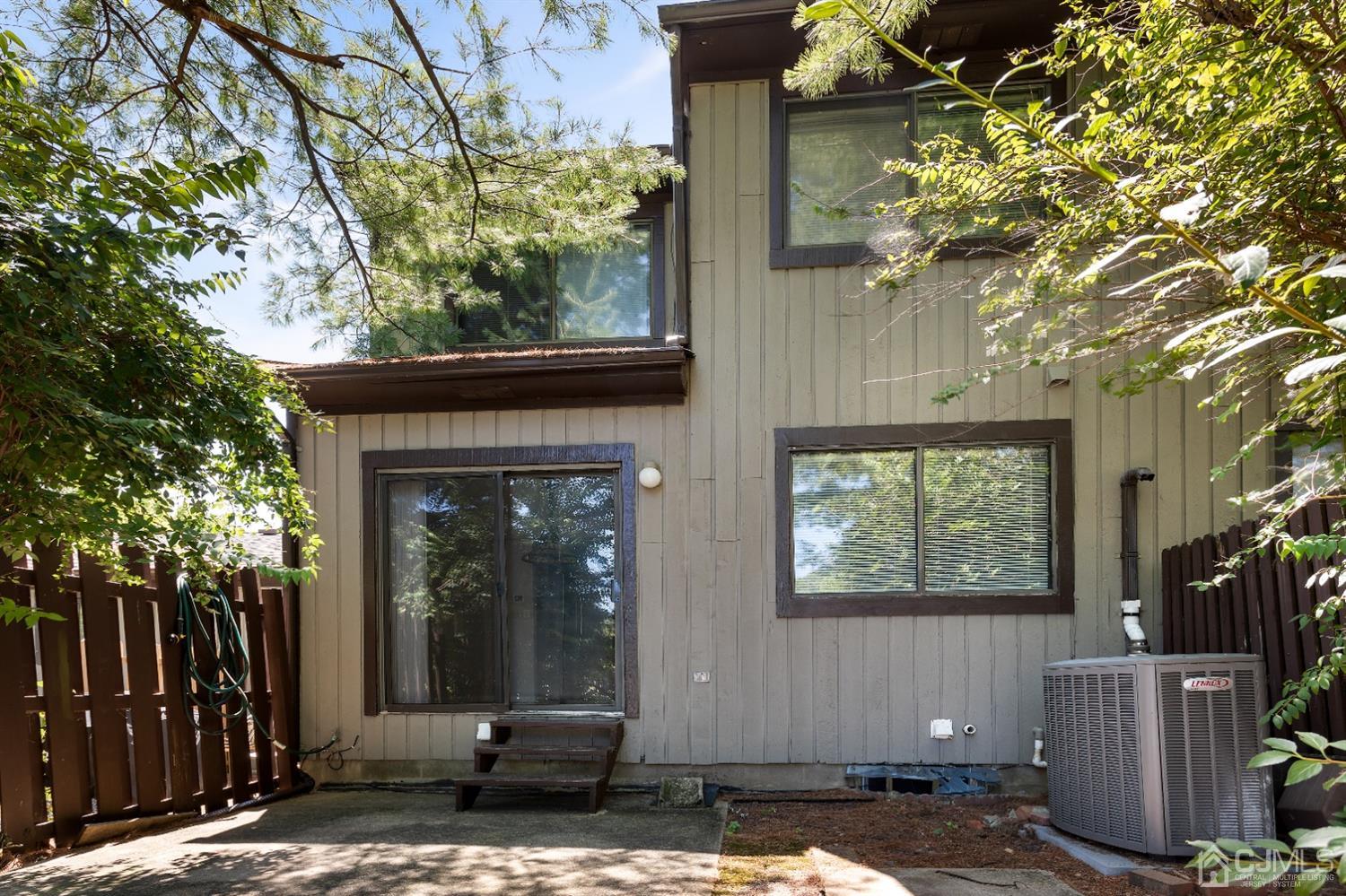 28 Arrowsmith Court Old Bridge, NJ 07747 - Photo 24 of 30 a front view of a house with garden