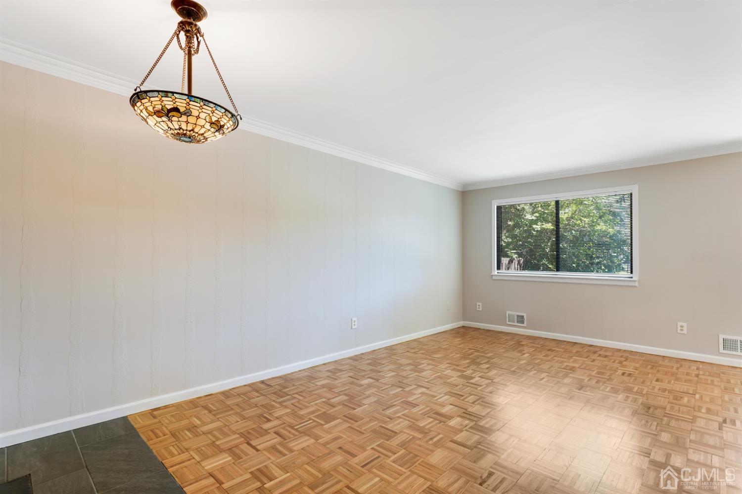 28 Arrowsmith Court Old Bridge, NJ 07747 - Photo 4 of 30 an empty room with a window