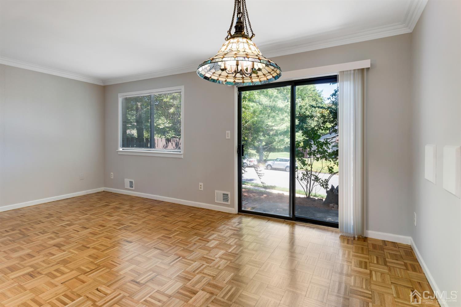 28 Arrowsmith Court Old Bridge, NJ 07747 - Photo 7 of 30 a view of an empty room with a window