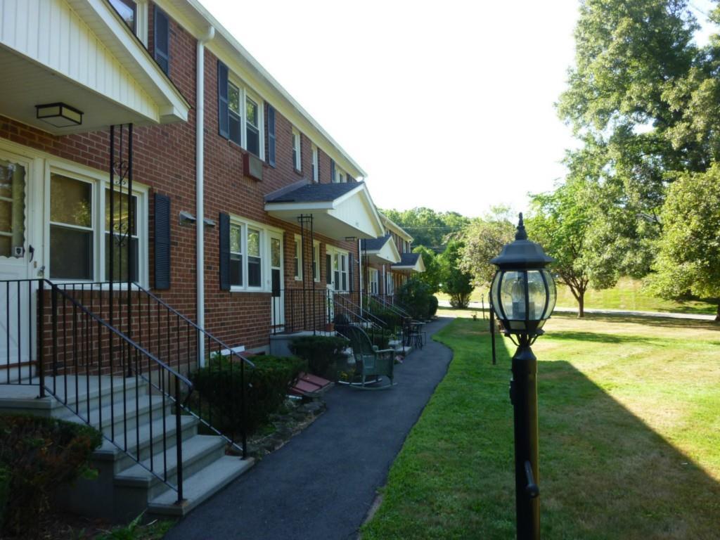 492 Radmere Road, Unit B Cheshire, CT 06410 - Photo 1 of 1 Front entrance surrounded by tree lined acreage.