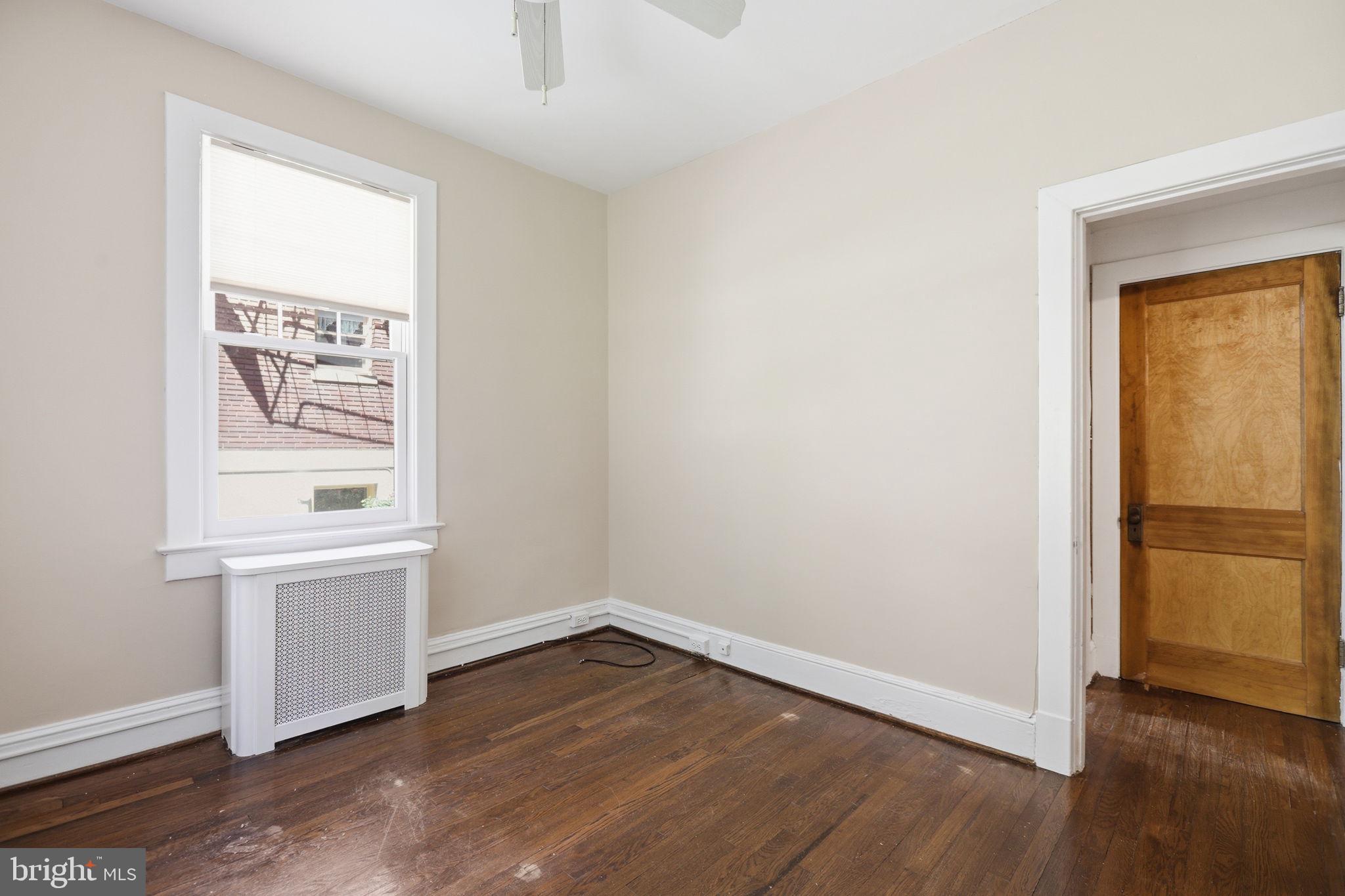 3018 Porter Street Northwest, Unit 103 Washington, DC 20008 - Photo 24 of 27 Bright and airy bedroom with natural light