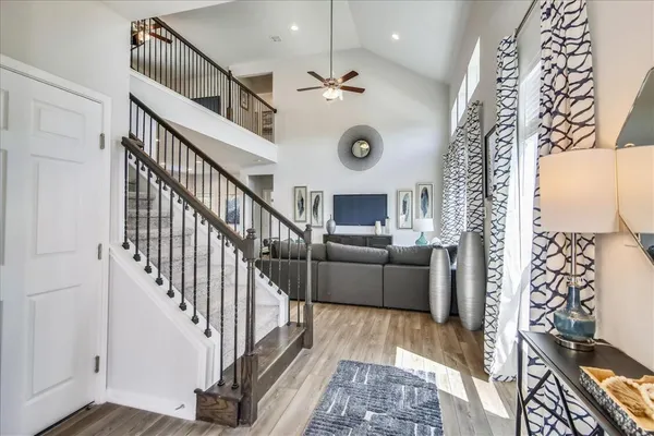 a living room with furniture and a table