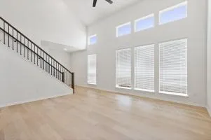 a kitchen with stainless steel appliances granite countertop a refrigerator and a stove