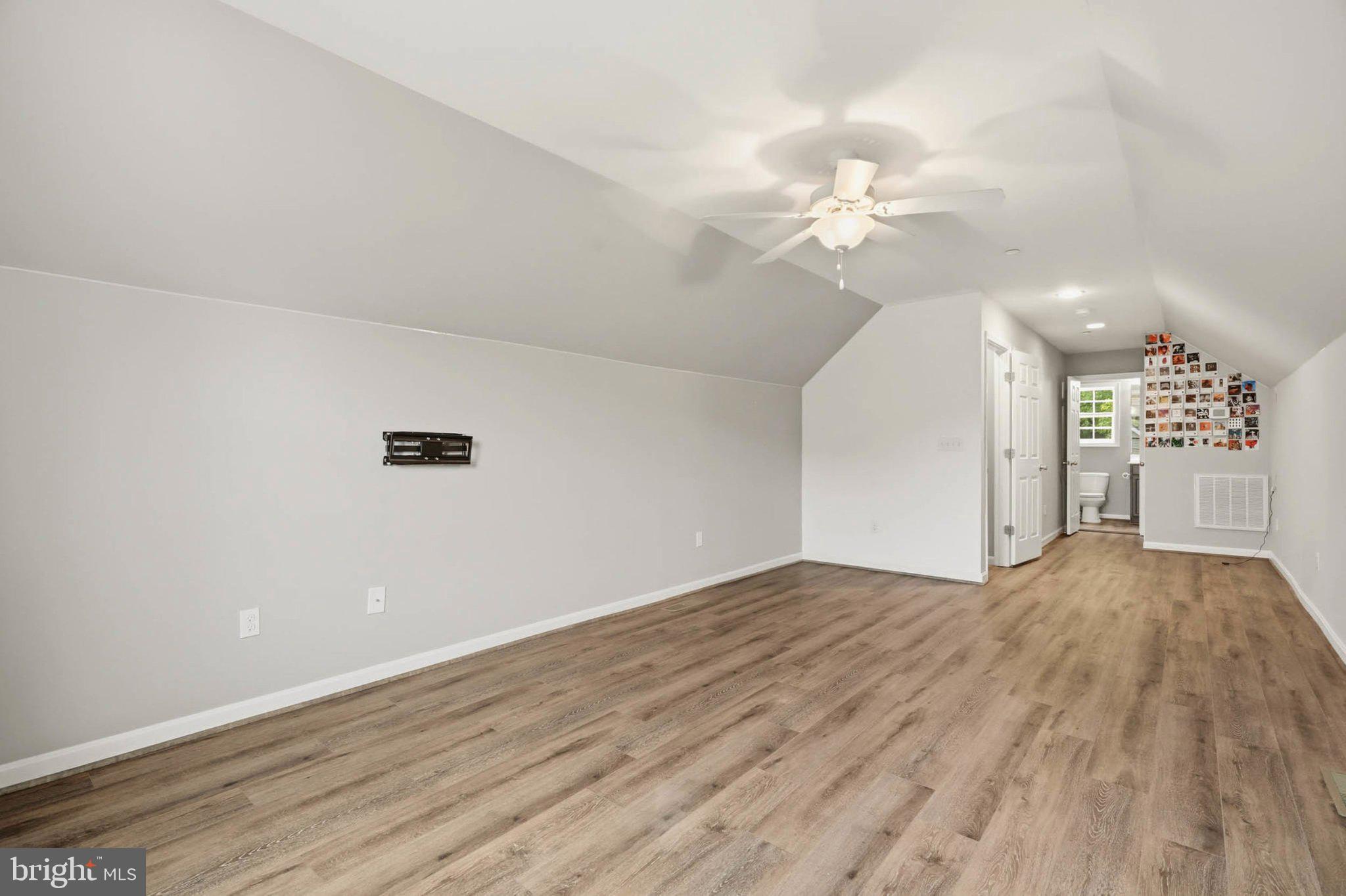 706 Trapper Way Deale, MD 20751 - Photo 42 of 61 Spacious attic retreat with natural light.