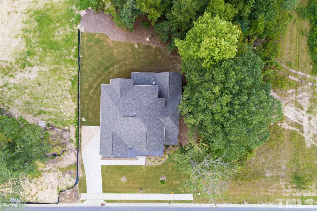 520 Adkins Ridge Road Rolesville, NC 27571 - Photo 2 of 25 an aerial view of a house with a yard