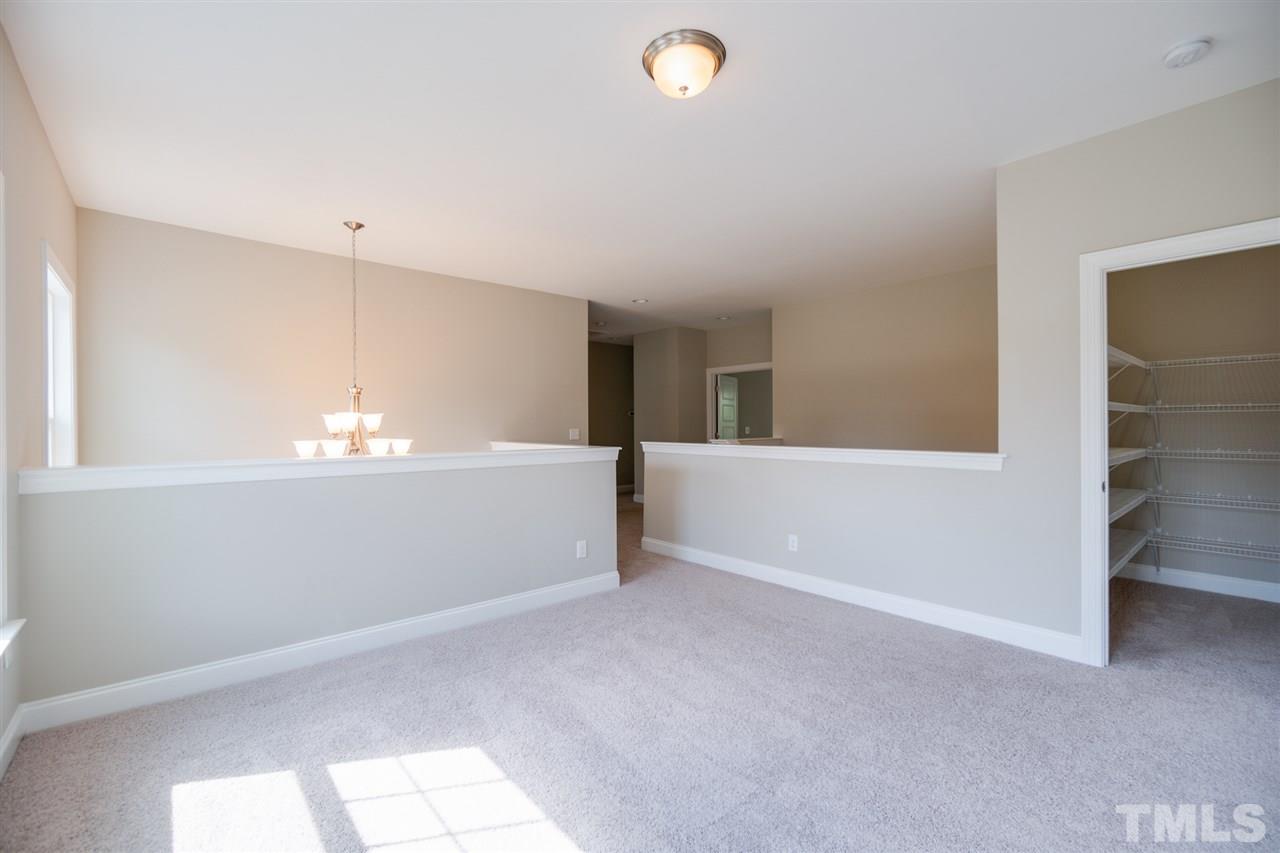 520 Adkins Ridge Road Rolesville, NC 27571 - Photo 21 of 25 a view of an empty room with a window