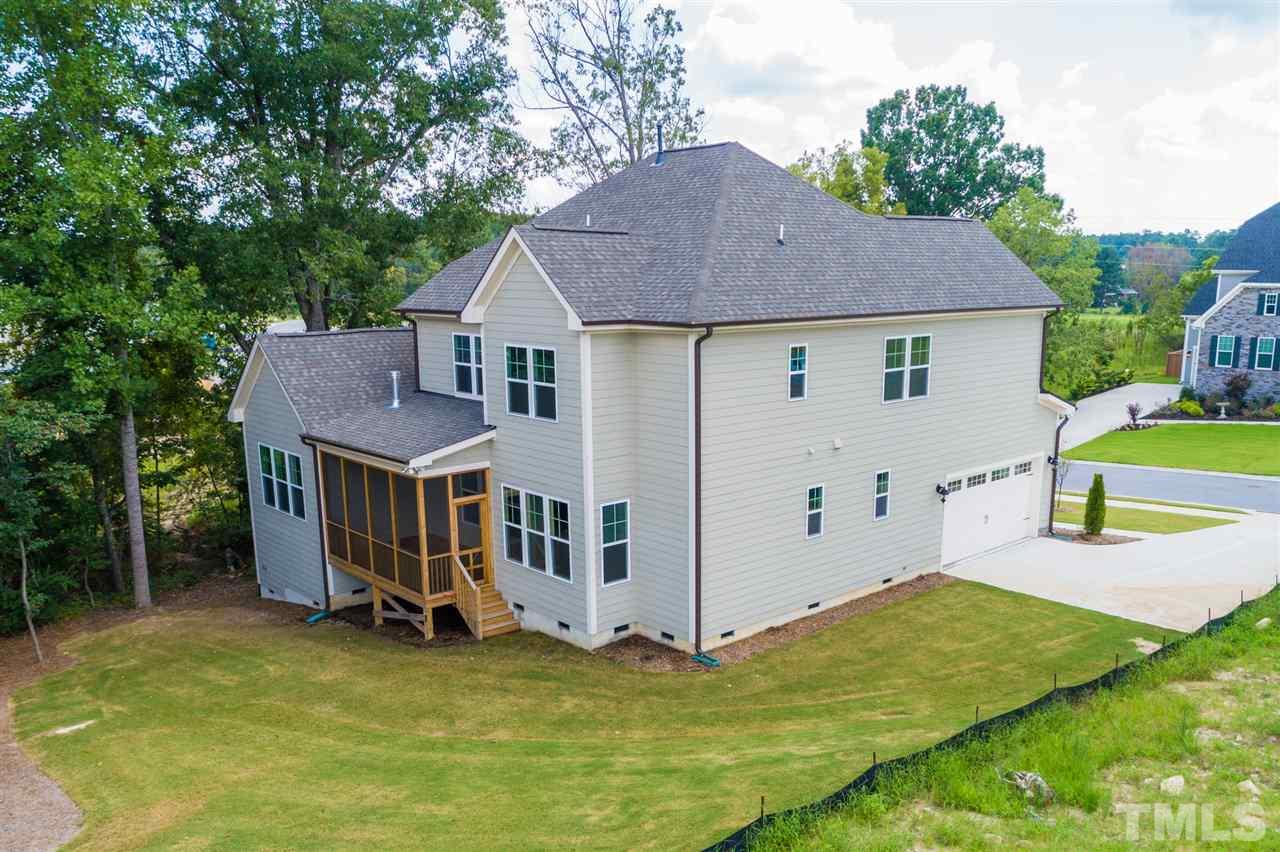 520 Adkins Ridge Road Rolesville, NC 27571 - Photo 25 of 25 a view of a house with backyard
