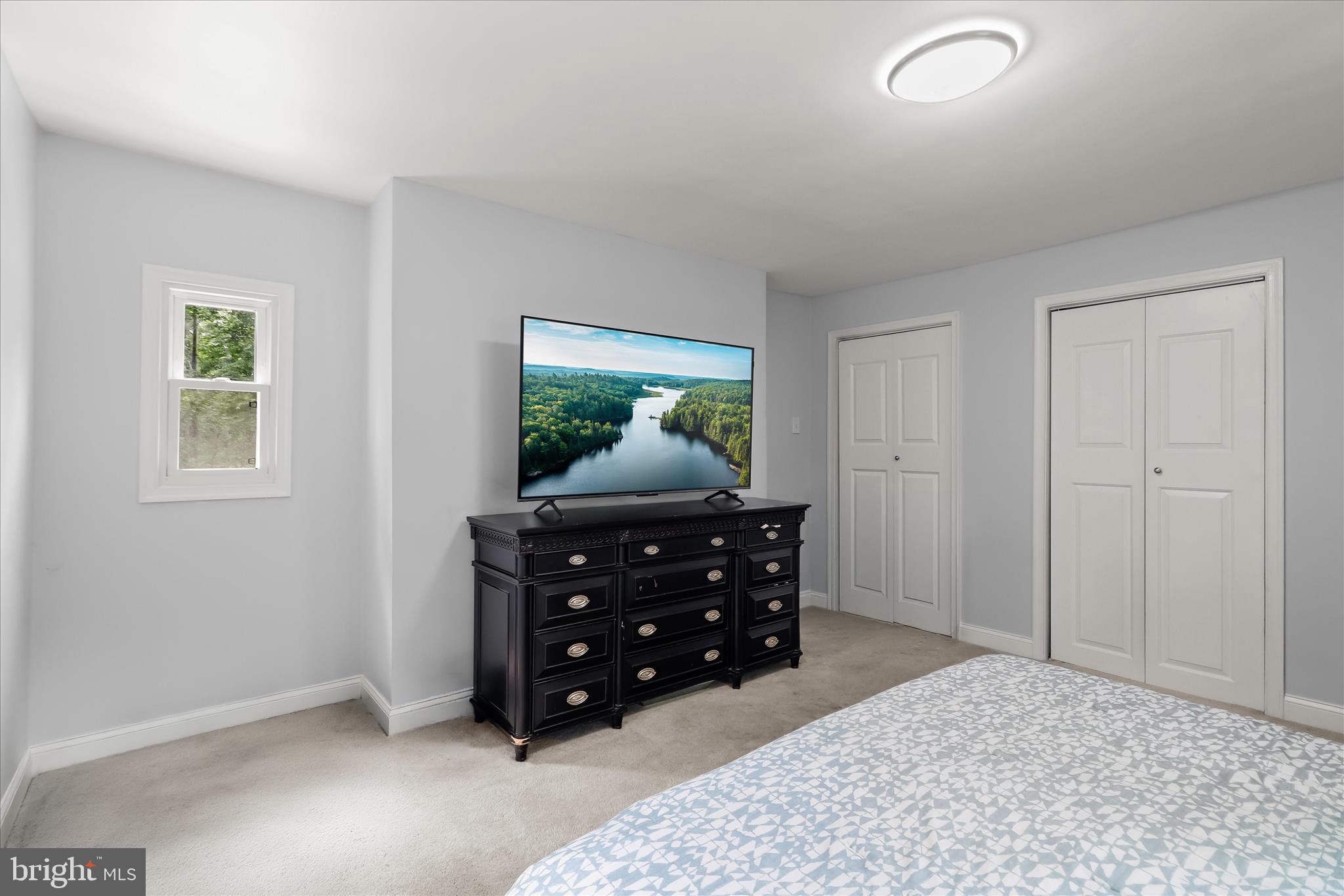 14213 Longnecker Road Reisterstown, MD 21136 - Photo 15 of 44 a room with a dresser and a window