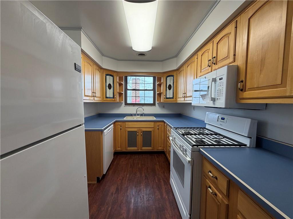 2225 Hampton Street Pittsburgh, PA 15218 - Photo 12 of 36 a kitchen with stainless steel appliances granite countertop a stove a sink and a microwave