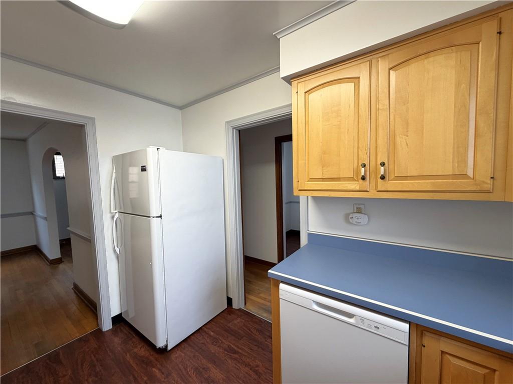 2225 Hampton Street Pittsburgh, PA 15218 - Photo 15 of 36 a kitchen with a refrigerator and a window
