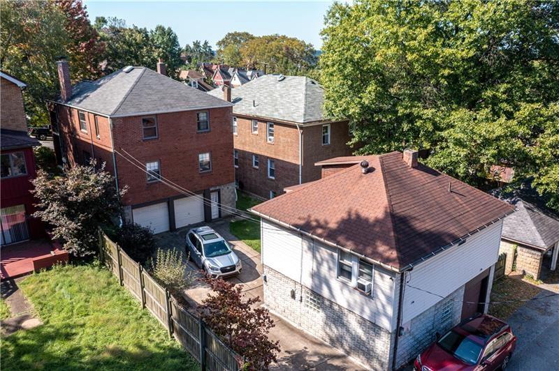 2225 Hampton Street Pittsburgh, PA 15218 - Photo 32 of 36 an aerial view of a house with large trees