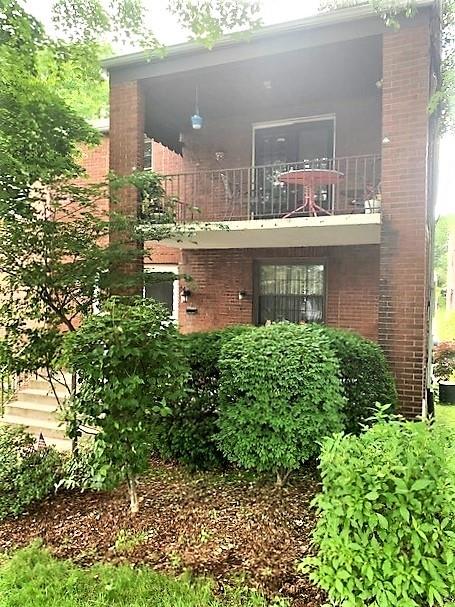2225 Hampton Street Pittsburgh, PA 15218 - Photo 4 of 20 a front view of a house with a yard and fountain in middle of the house