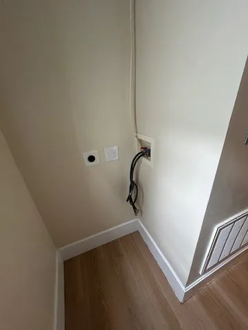 a view of a room with racks on the wall