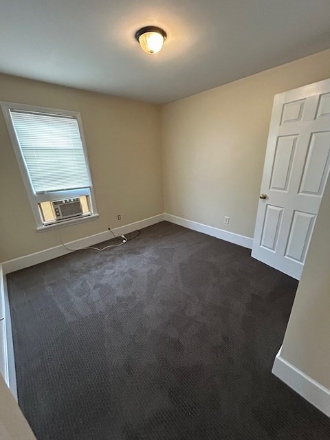 45 Sturbridge Street, Unit 3 Boston, MA 02126 - Photo 13 of 14 an empty room with windows