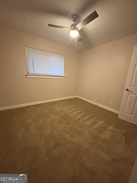 3260 Valley Bend Road South Fulton, GA 30349 - Photo 15 of 23 an empty room with a fan